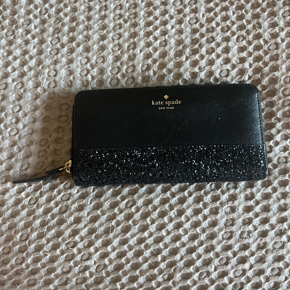 Black Kate spade wallet with glitter detail